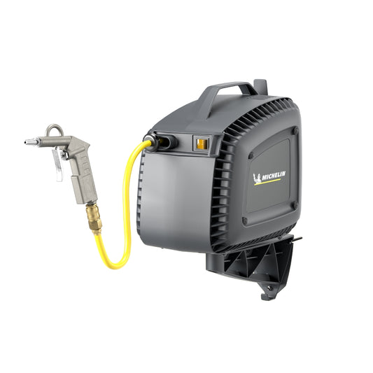 Grey portable handheld Michelin air compressor with yellow hose with logo on the side on a white background