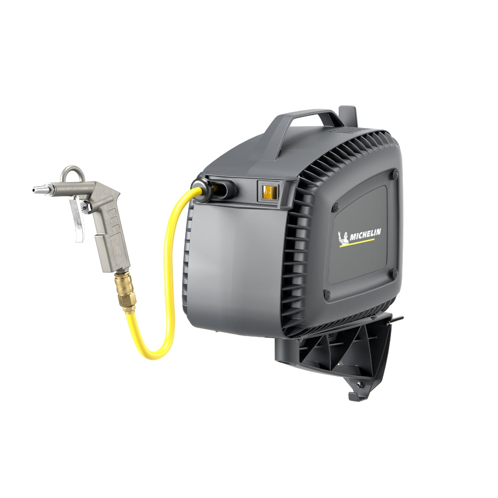 Grey portable handheld Michelin air compressor with yellow hose with logo on the side on a white background