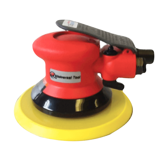 A red and black handheld orbital sander with a yellow sanding pad attached, shown on a white background.
